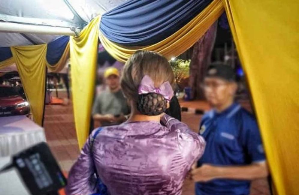 Pempengaruh, Melinda B Didenda Kerana Berpakaian Seperti Wanita